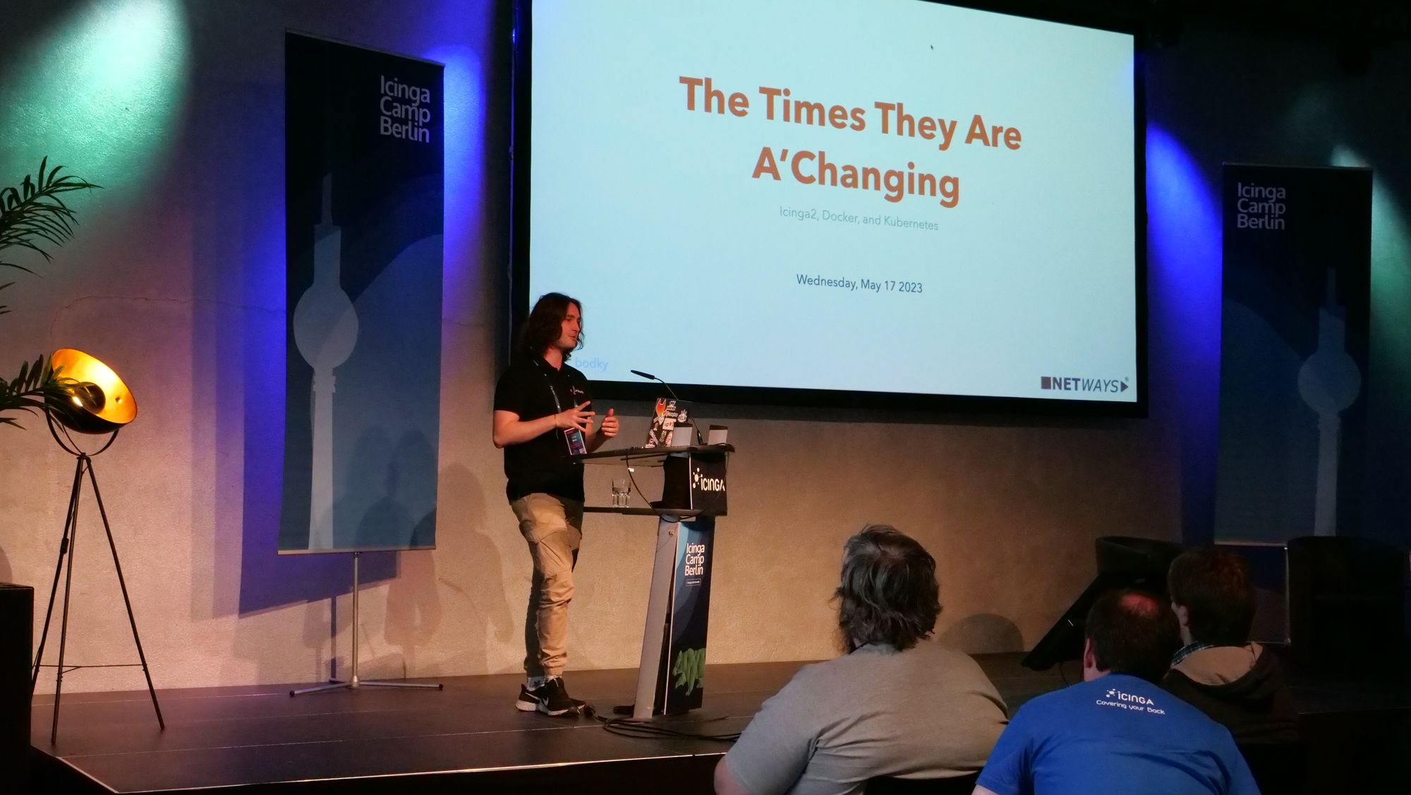 Daniel on stage at Icinga Camp Berlin 2023